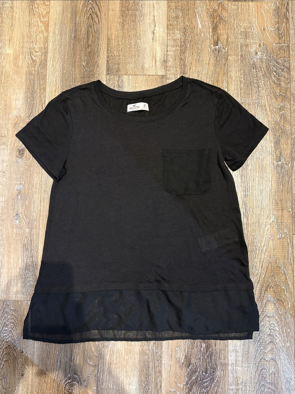 Black Short-Sleeve Pocket Tee with Sheer Hem - Women's Top